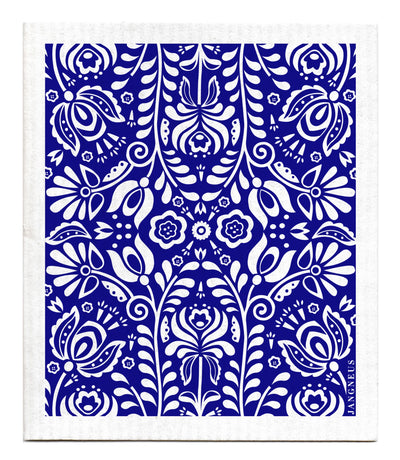 White kaleidoscope pattern of flowers and leaves on a blue background. Kaleidoscope is mirrored 4 ways. 