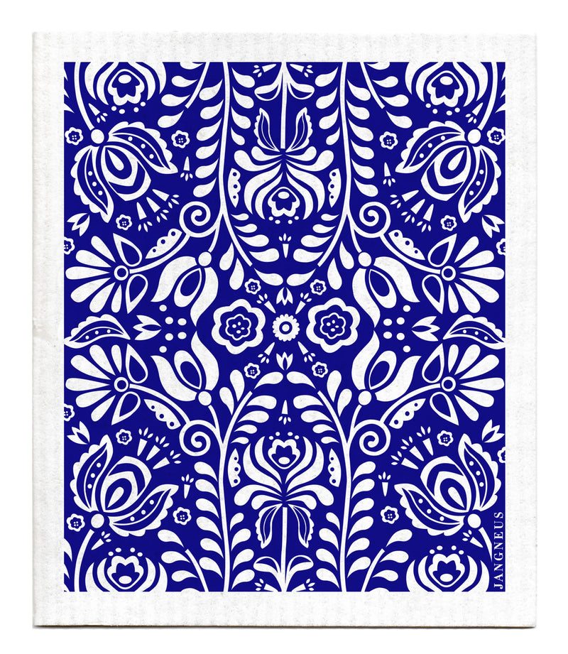 White kaleidoscope pattern of flowers and leaves on a blue background. Kaleidoscope is mirrored 4 ways. 